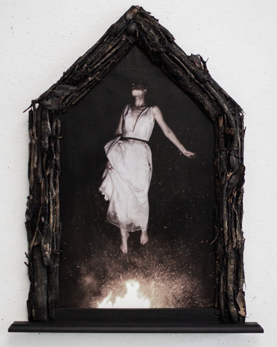 Broken Sundowns - Fire to Wind (2015) from the Eight Stages of Dissolution series. Photograph with handmade frame embellished with bushfire sticks and leaves.
