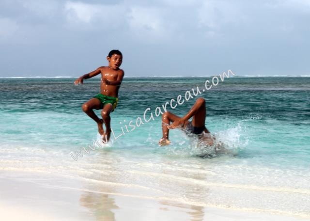 Bespoke Art by Liisa Garceau - Kuna children showing off for the camera. San Blas.